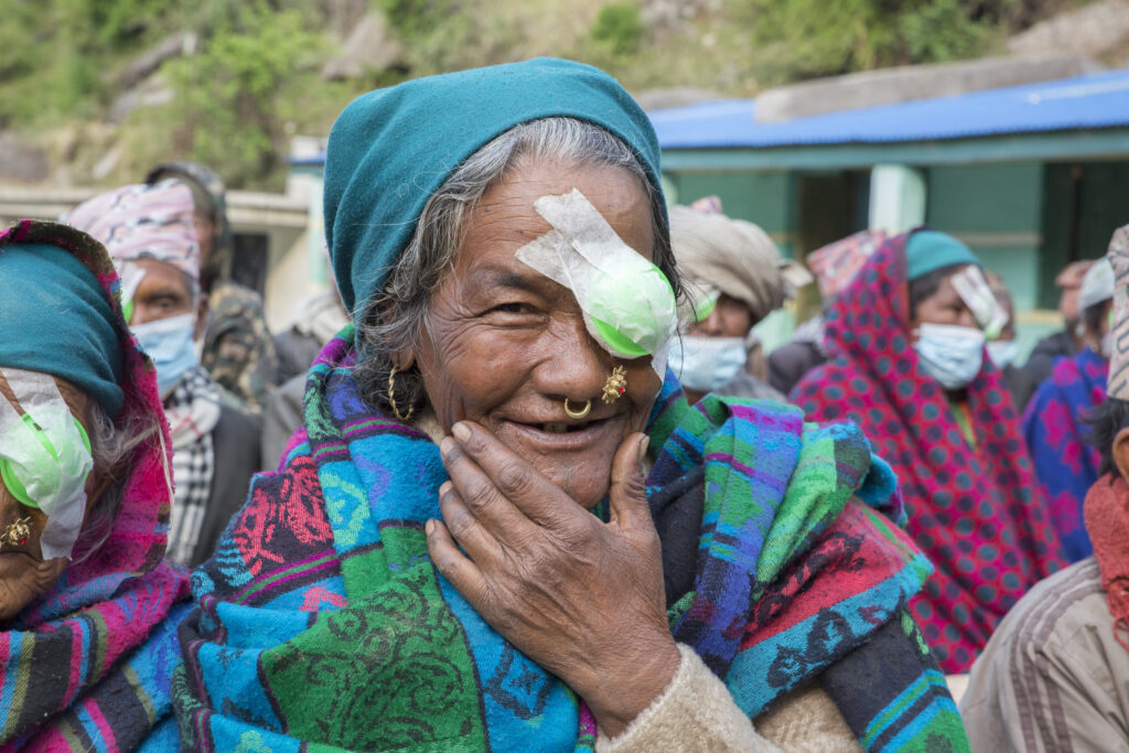 Photo shows a woman who received sight-restoring cataract surgery during a surgical outreach camp in rural Nepal organised by CBM together with its local partner NNJS.